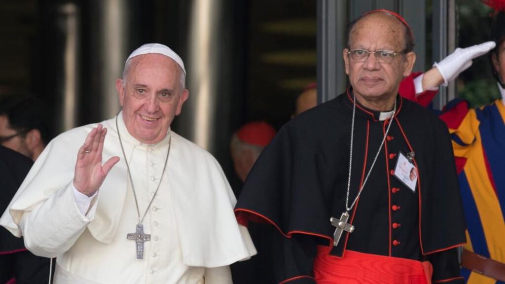 Pope Francis is flanked by the Archbishop of Bombay Cardinal Oswald Gracias. The cardinal has said “everybody is travelling in a particular direction, basically in harmony without complete uniformity”. Photograph: Alessandra Tarantino/AP