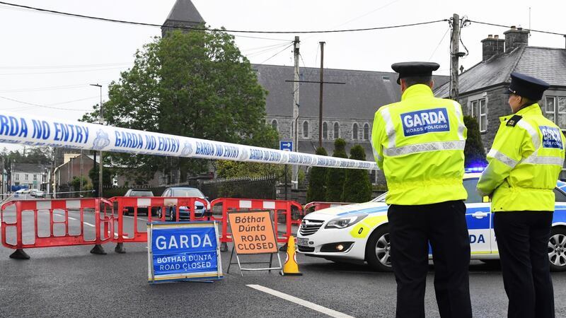 Gardaí at the scene of the fatal shooting of a detective in Castlerea on Thursday. Photograph: Michael McCormack