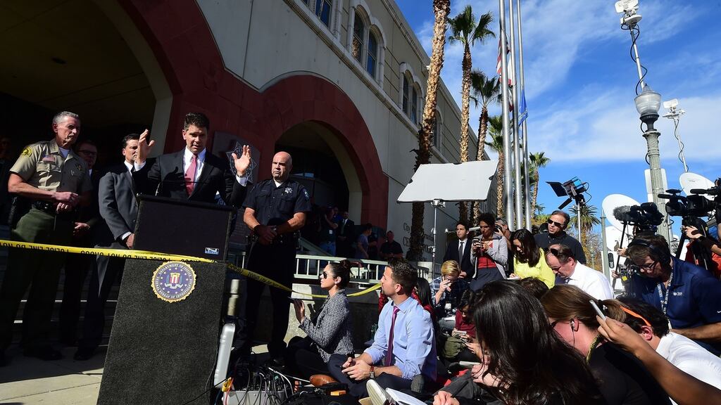 David Bowdich of the FBI briefs the press outside the San Bernardino Police Department on December 7th, 2015 in San Bernardino, California. The husband and wife who killed 14 people in last week’s shooting rampage in California were both radicalised “for quite some time” he said. Photograph: Frederic J Brown/AFP/Getty Images