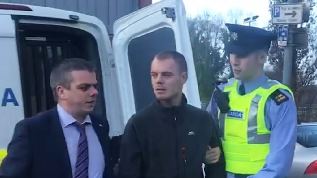 Stephen McDonagh (25), centre, arrives at Cavan District Court to face charges in connection to the alleged hijacking of a minibus from Dublin Airport. Photograph: Cate McCurry/PA Wire