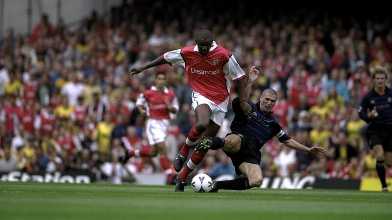 Roy Keane tackles Patrick Vieira during a Premeir League clash in 1999. Photo: Clive Brunskill /Allsport
