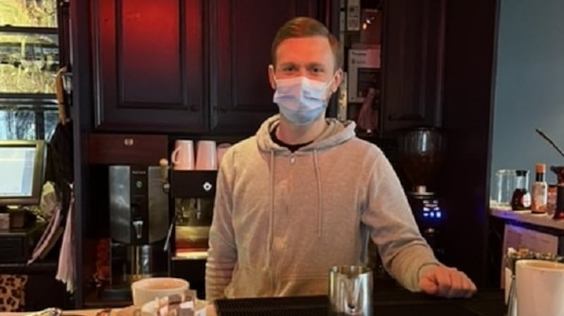 Andrew Gannon at work in Gallagher’s Pub in Cork city after Covid-19 restrictions were lifted. ‘One customer was asking me when we were getting the bar stools back.’