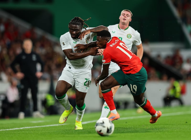 Ireland's Festy Ebosele and Portugal’s Nuno Mendes. Photograph: Ryan Byrne/Inpho