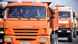 Trucker Putin opens Russia bridge link with annexed Crimea