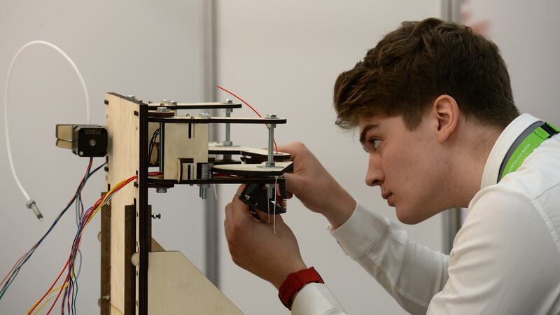 Josh Luke Mitchell with his low-cost 3D printer at the European Union Contest for Young Scientists at the RDS. Photograph: Cyril Byrne/The Irish Times