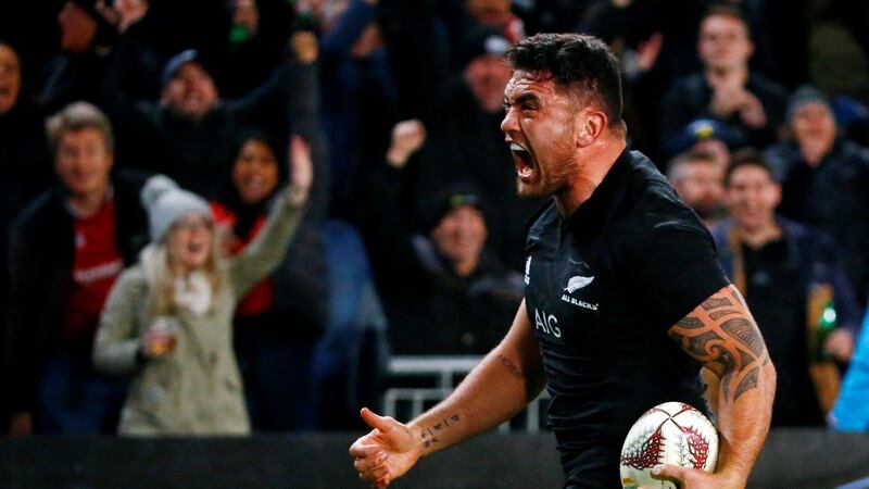 New Zealand’s Codie Taylor celebrates after scoring the first try. Photograph: David Gray/Reuters
