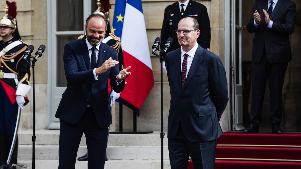 Edouard Philippe applauds his successor as French prime minister, Jean Castex, during a handover ceremony at the Hotel de Matignon, the official residence of the French prime minister, in Paris on Friday. Photograph: Jeanne Frank/Bloomberg