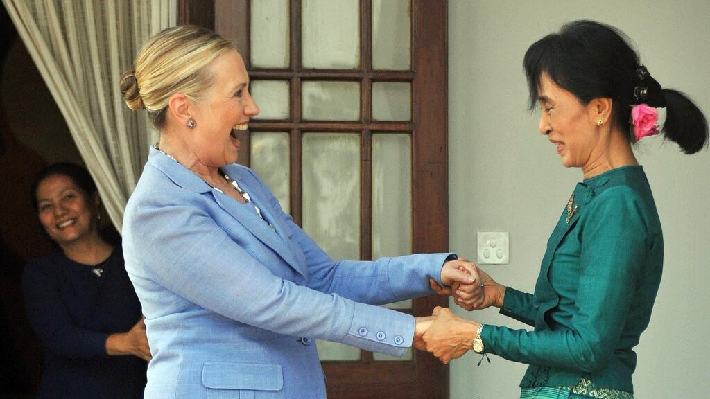 Burmese opposition leader Aung San Suu Kyi greets US secretary of state Hillary Clinton at her residence in Rangoon in December 2011. Photograph: Soe Than WIN/AFP/Getty Images