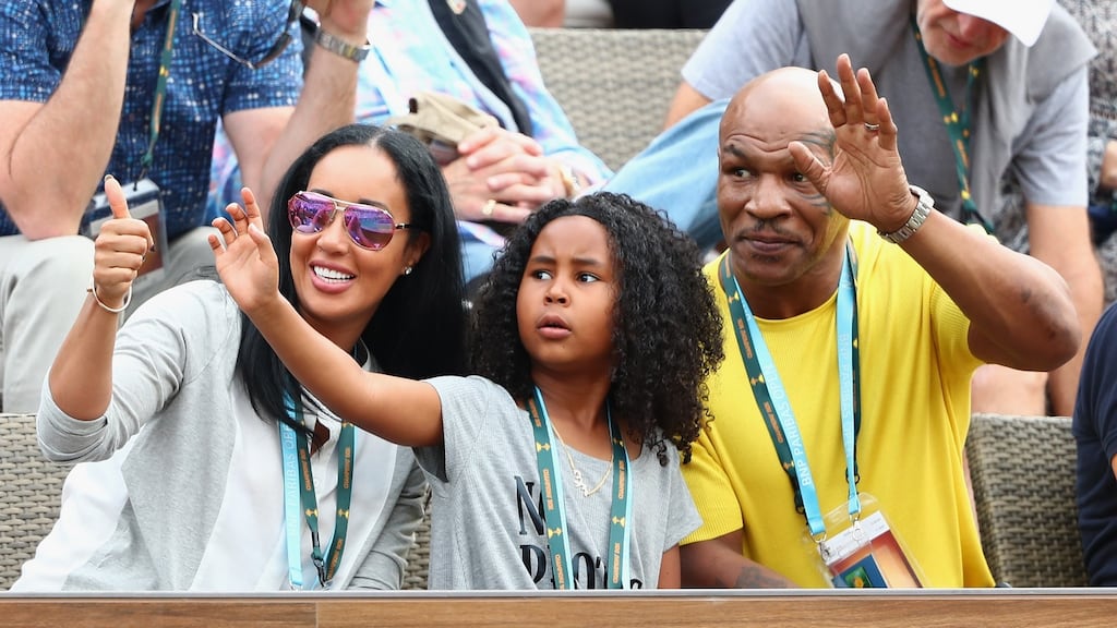 Kike Tyson, Milan Tyson and Mike Tyson enjoying the tennis at the BNP Paribas Open at Indian Wells Tennis Garden in Indian Wells, California. Photograph: Julian Finney/Getty Images