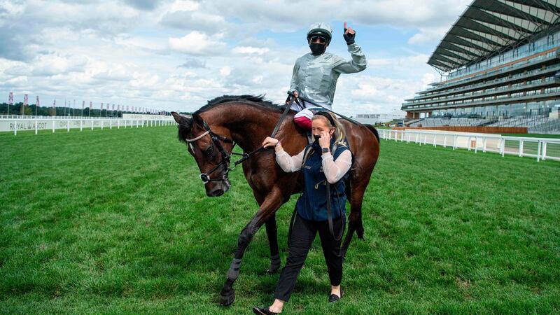Jockey Frankie Dettori celebrates winning the St James’s Palace Stakes on Palace Pier. Photograph: Getty Images