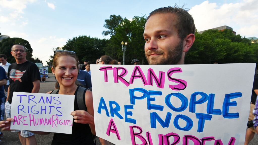 Protesters gather in front of the White House after President Trump announced transgender people may not serve ‘in any capacity’ in the US military. Photograph: AFP Photo