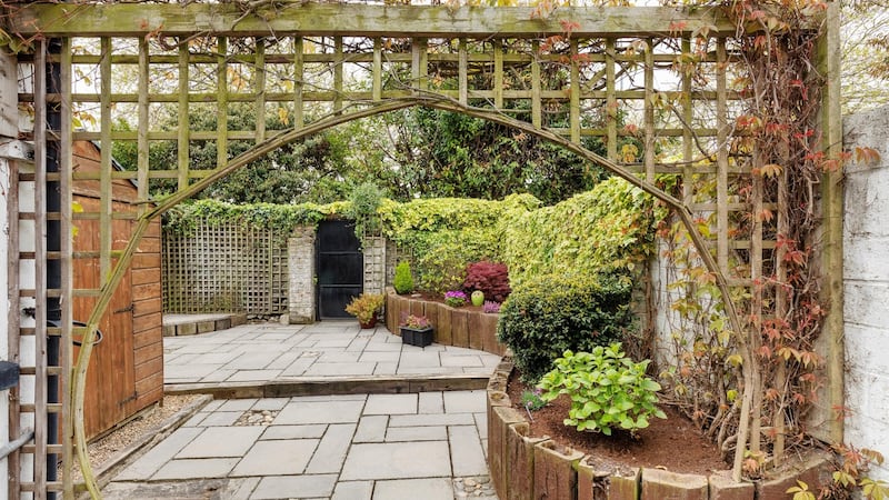 Number 37  has a leafily delightful, split-level walled rear patio-garden with cobbles, a trellis arch and pedestrian access from a gated laneway