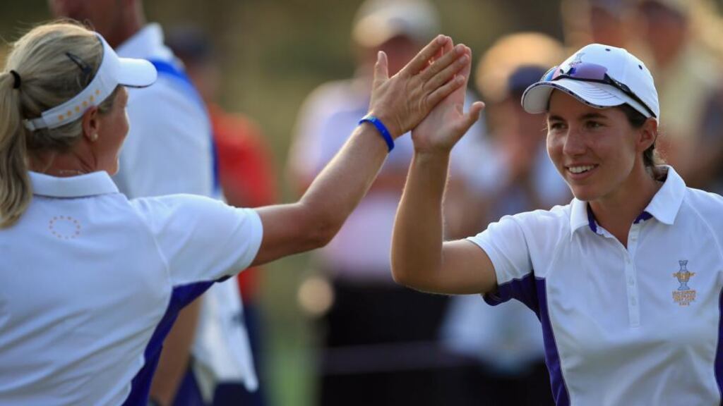 Suzann Pettersen of Norway (left) and Carlota Ciganda of Spain celebrate on the 18th green after they defeated Stacy Lewis and Lexi Thompson of the Untied States in Parker, Colorado. Photograph: Doug Pensinger/Getty Images