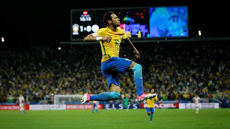 Neymar celebrates after scoring for Brazil in their World Cup qualifier against Paraguay. Photo: Getty Images