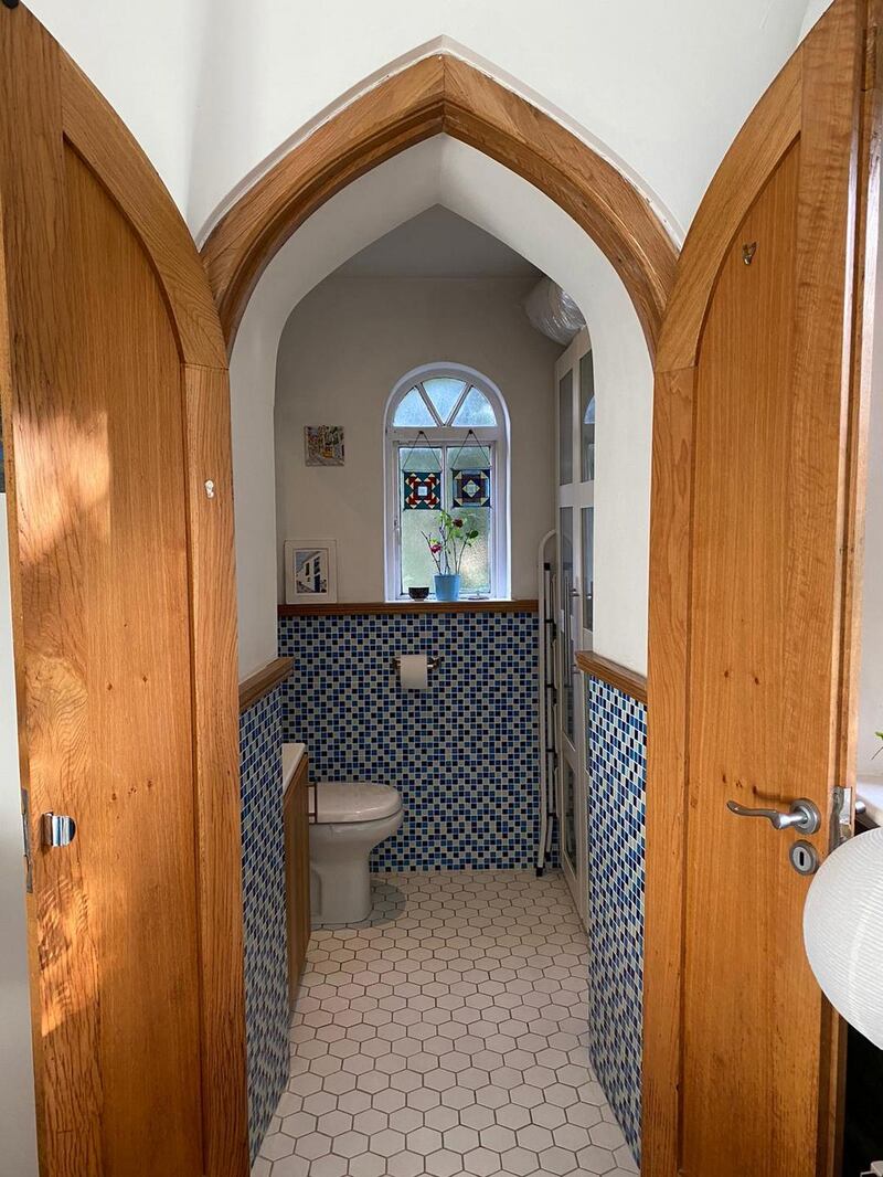 Gothic arched doors and bathroom