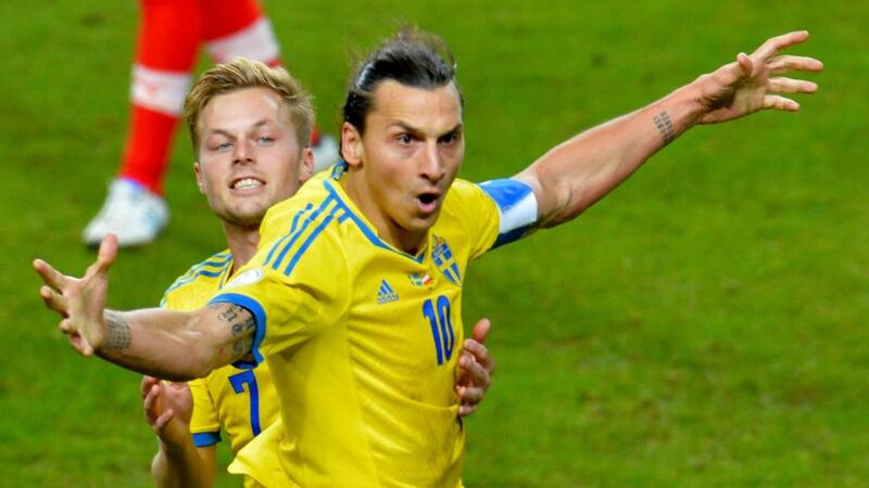 Sweden’s Zlatan Ibrahimovic (front) celebrates with teammate Sebastian Larsson after scoring against Austria earlier this month. Photograph: Jonas Ekstromer/TT News Agency/Reuters