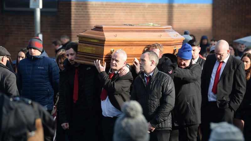 A coffin bearing the remains of Derek Coakley-Hutch is carried into Our Lady of Lourdes Church, Sean McDermott Street. Photograph: Alan Betson