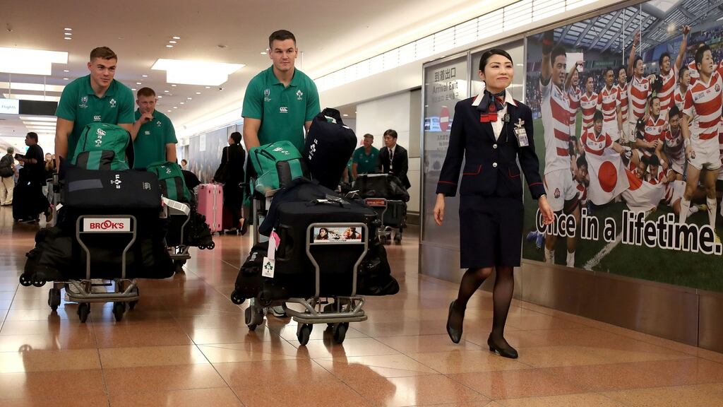 Garry Ringrose and Jonathan Sexton arrive in Tokyo with the Ireland team yesterday. Photo: Dan Sheridan/Inpho