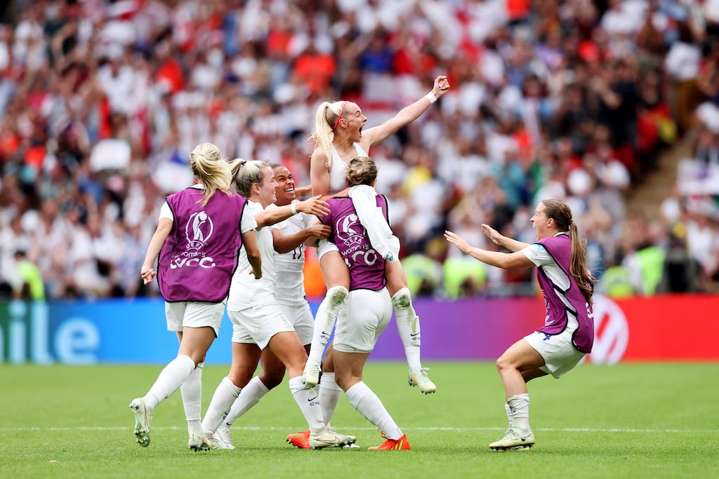 Chloe Kelly of England celebrates with her team after scoring her side's second goal during the UEFA Women's Euro 2022 final. Photograph: Naomi Baker/Getty