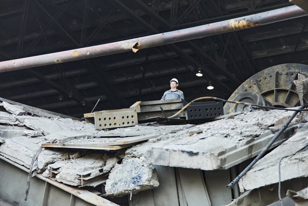 A DTEK employee works to restore a power station after Russian attacks in March 2024. Photograph: DTEK