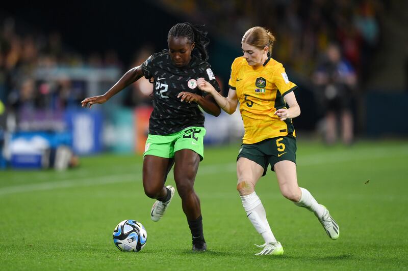 Michelle Alozie of Nigeria controls the ball against Cortnee Vine of Australia. Photograph: Justin Setterfield/Getty Images