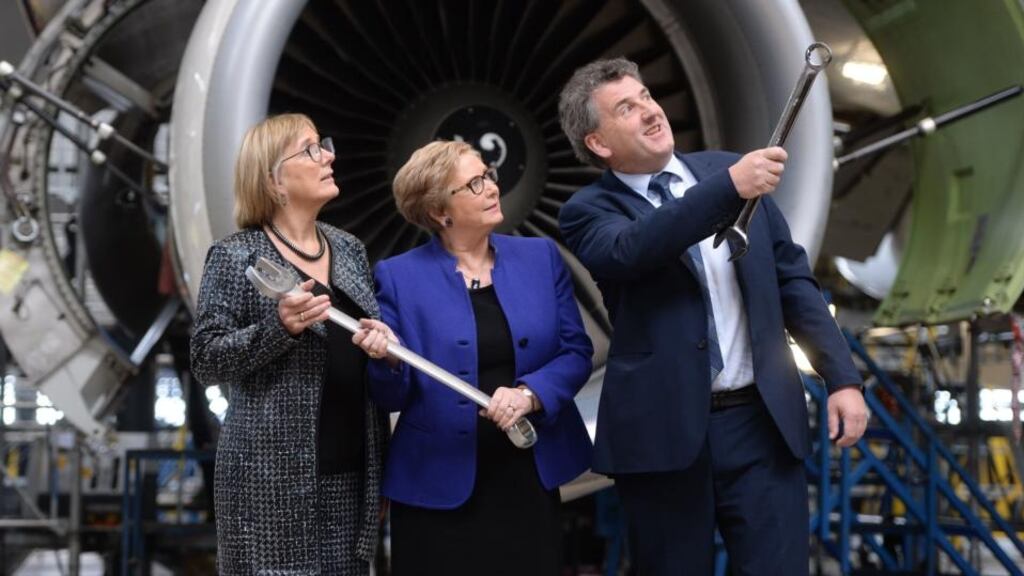 Enterprise Ireland chief executive Julie Sinnamon , Tánaiste Frances Fitzgerald and Dublin Aerospace chief executive Michael Tyrrell at the announcement of 150 new jobs at the company. Photograph: Alan Betson