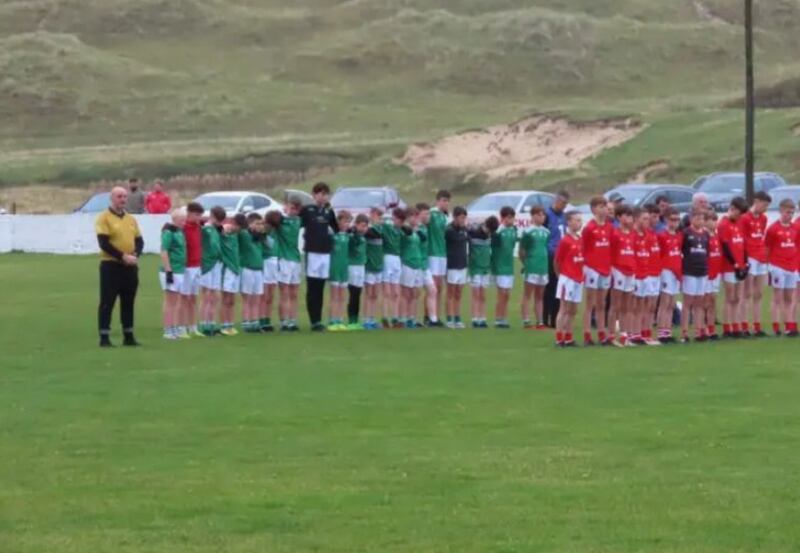 The minute's silence before the game between Naomh Mícheál and Naomh Mhuire in Dunfanaghy. Photograph: St Michael’s Minor Board/Facebook