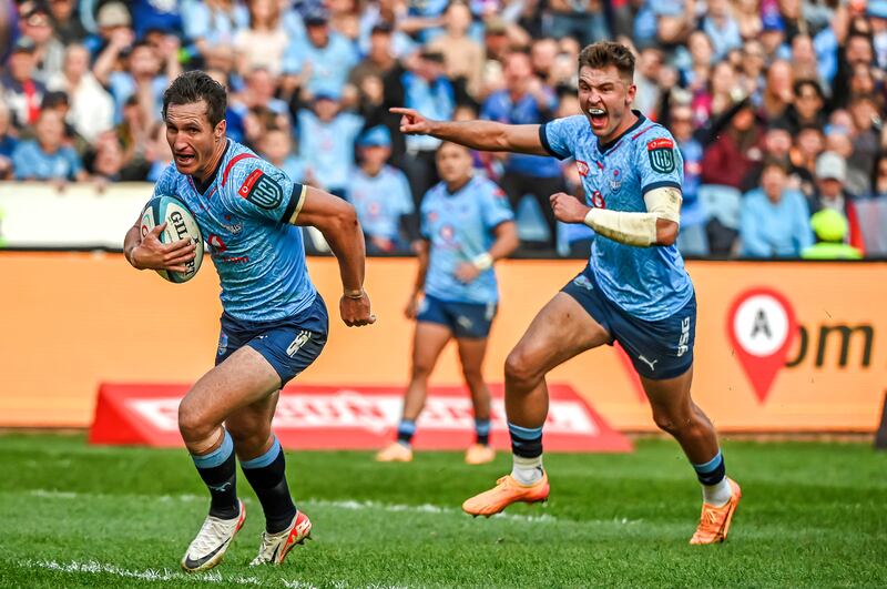 Johan Goosen is cheered on by David Kriel as he goes in for the first Bulls try during the BKT United Rugby Championship semi-final at Loftus Versfeld in Pretoria. Photograph: Deon van der Merwe/Inpho/Steve Haag Sports