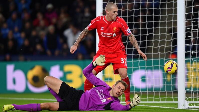 Martin Skrtel of Liverpool looks on as Simon Mignolet unwittingly of Liverpool scores an own goal against Leicester City at The King Power Stadium. Photograph: Shaun Botterill/Getty Images