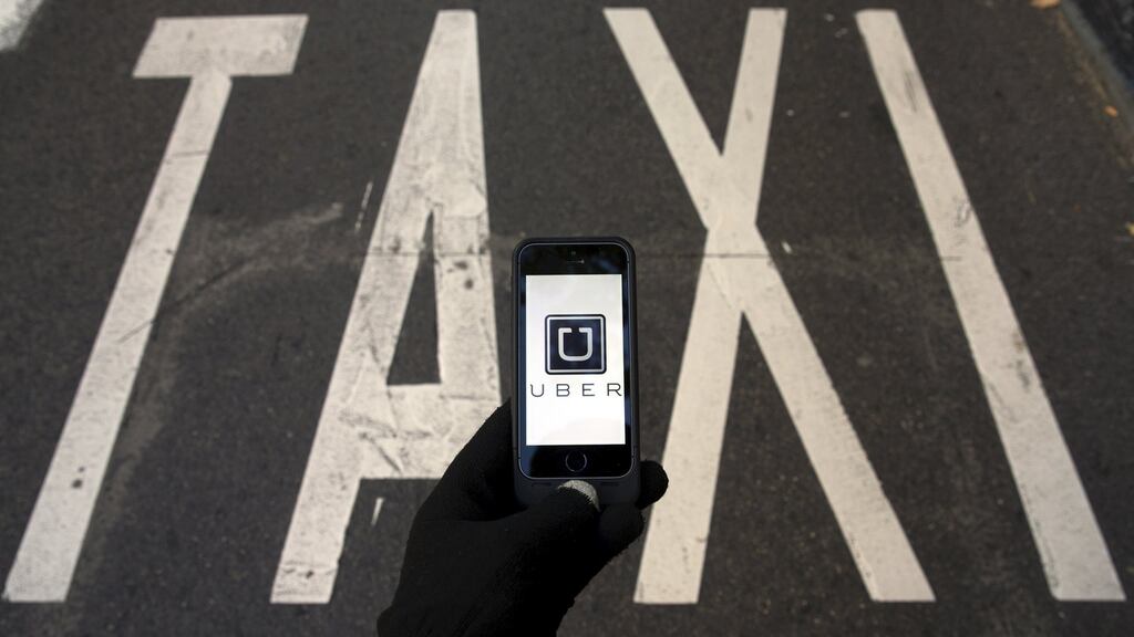 Uber: The pilot will allow the company to demonstrate the benefits of a ride-sharing service to transport in underserved areas of Ireland. Photograph: Sergio Perez/Reuters