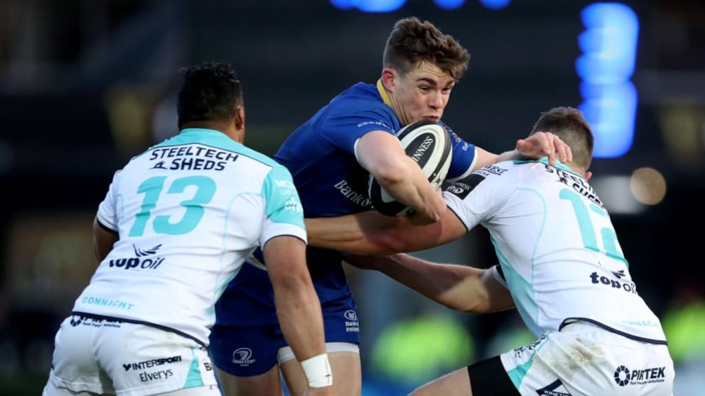 Garry Ringrose is tackled by Connacht’s Tom Farrell and Bundee Aki. Photograph: Bryan Keane/Inpho