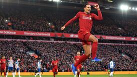 Liverpool extend their lead despite late scare