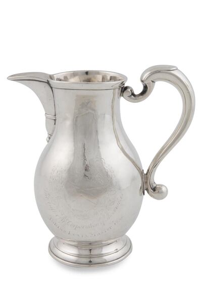 George I beer jug with moulded rim and scroll handle, inscribed “The Gift of the Corporation of Shoemakers, 1725” (Lot 92, €5,000-€8,000)