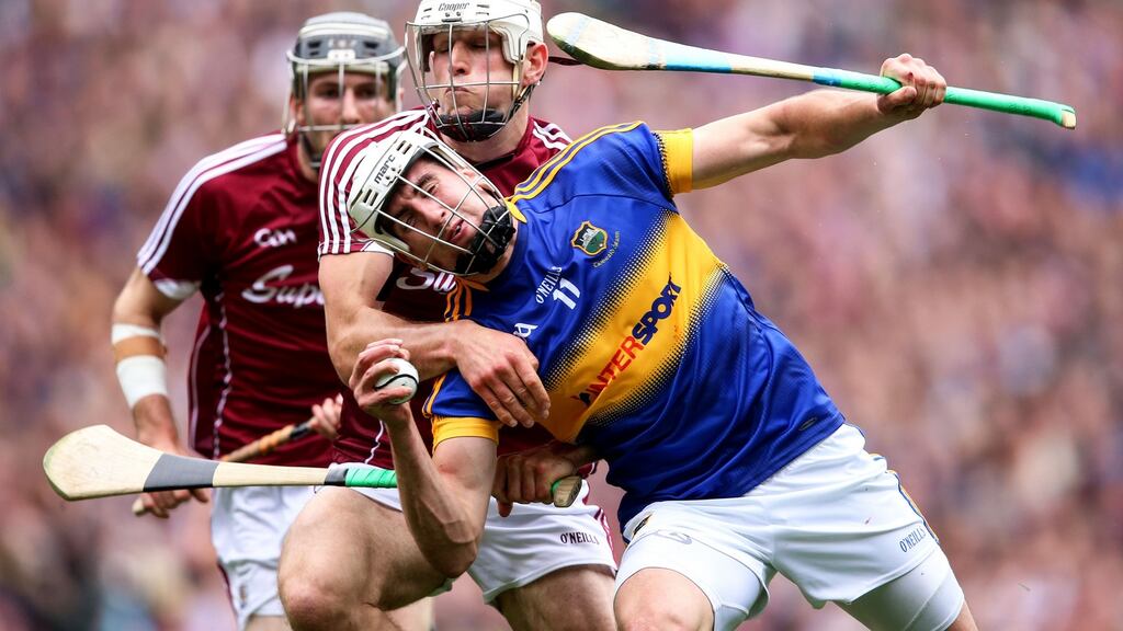 Gearóid McInerney attempts to bottle up Patrick Maher in last year’s semi-final. Photograph: Inpho/Tommy Dickson