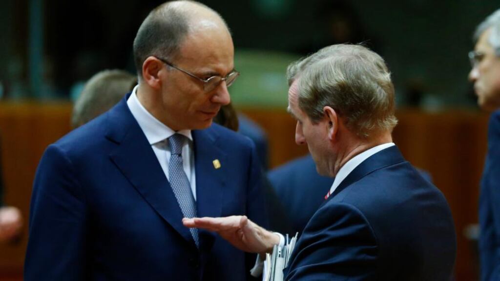 Italy’s prime minister Enrico Letta with Taoiseach Enda Kenny during a European Union leaders summit in Brussels last night. Photograph: Yves Herman/Reuters