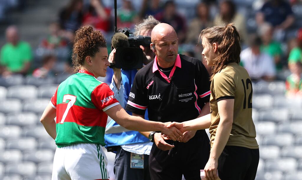 Kerry's Anna Galvin (right) shakes hands with Mayo's Kathryn Sullivan in the Ladies Football Senior Championship semi-final in Croke Park last year. Photograph: Bryan Keane/Inpho
