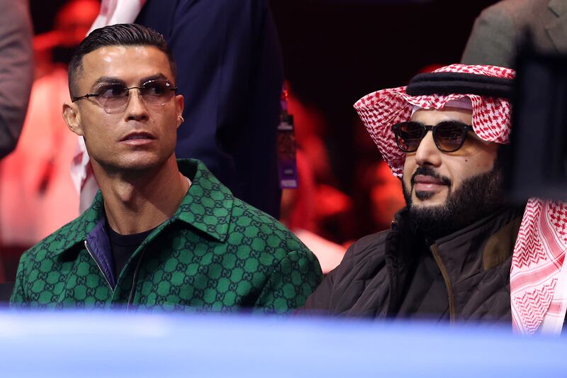 Cristiano Ronaldo with Turki Alalshikh at a 'Day of Reckoning: Fight Night' at Kingdom Arena in Riyadh, Saudi Arabia. Photograph: Richard Pelham/Getty Images
