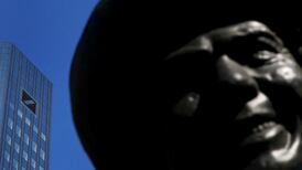 Deutsche Bank posts profit, agrees to sell Mexico units