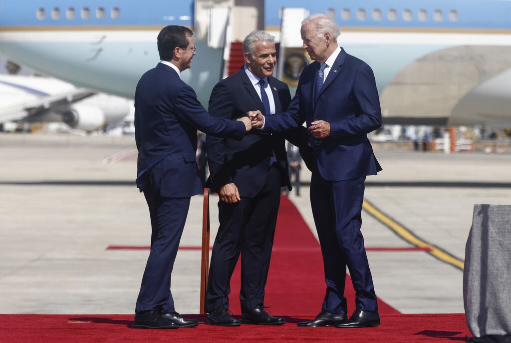 Israeli president Isaac Herzog and prime minister Yair Lapid greet US president Joe Biden on his arrival at Ben Gurion International Airport in Tel Aviv. Photographer: Kobi Wolf/Bloomberg