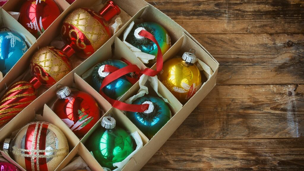 Back at Ma’s old house, I climbed into the attic. In a cobwebby corner was a cardboard box, ancient, battered, packed to the gills with the Christmas trinkets I’d know since I was five. Every single gaudy bauble, every moth-eaten felt robin was there. Photograph: iStock