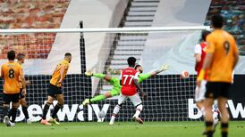 Arsenal check Wolves to relight their European fire