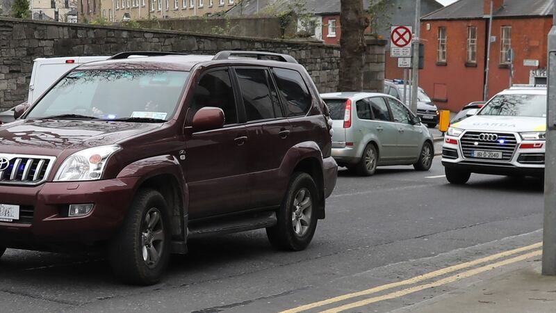 Garda convoy carrying Imre Arakas (58) arriving at the Dublin District Court, Criminal Courts of Justice, on Thursday afternoon. Photograph: Collins Courts