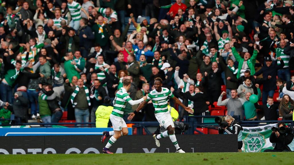 Celtic’s Moussa Dembele celebrates scoring the winner in their League Cup clash with Rangers. Photo: Jason Cairnduff/Reuters