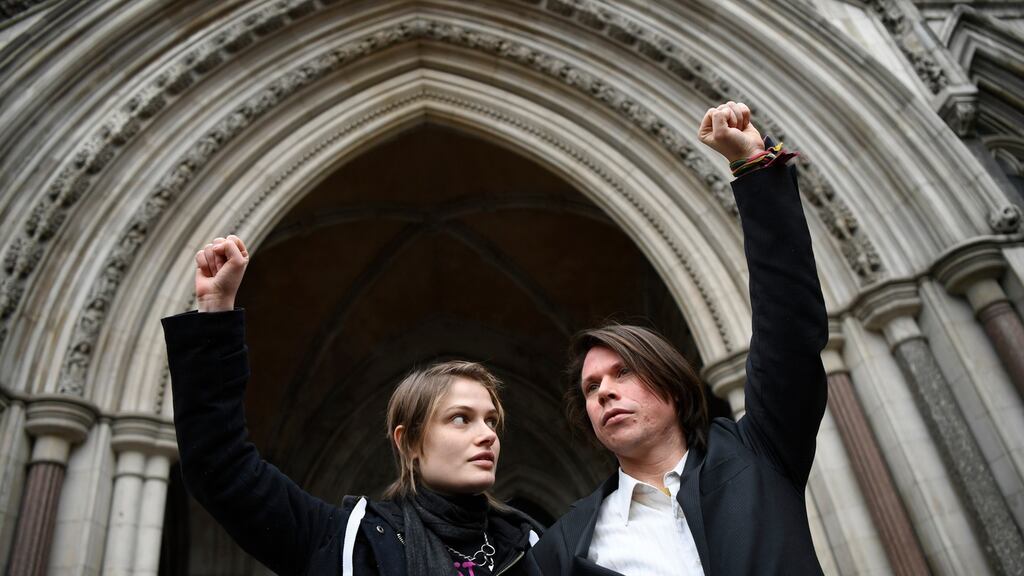 Alleged British computer hacker Lauri Love (R) and his partner Sylvia Mann (L) pose for media in  London, Britain. Photograph: Neil Hall/EPA