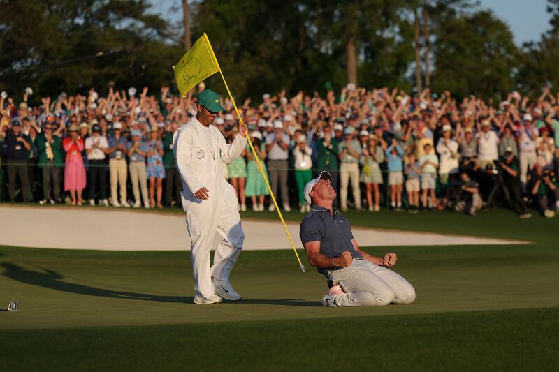 Rory McIlroy of Northern Ireland celebrates winning with caddie Harry Diamond after the playoff hole during the final round of the 2025 Masters Tournament at Augusta National Golf Club in Augusta, Georgia. Photograph: Andrew Redington/Getty Images