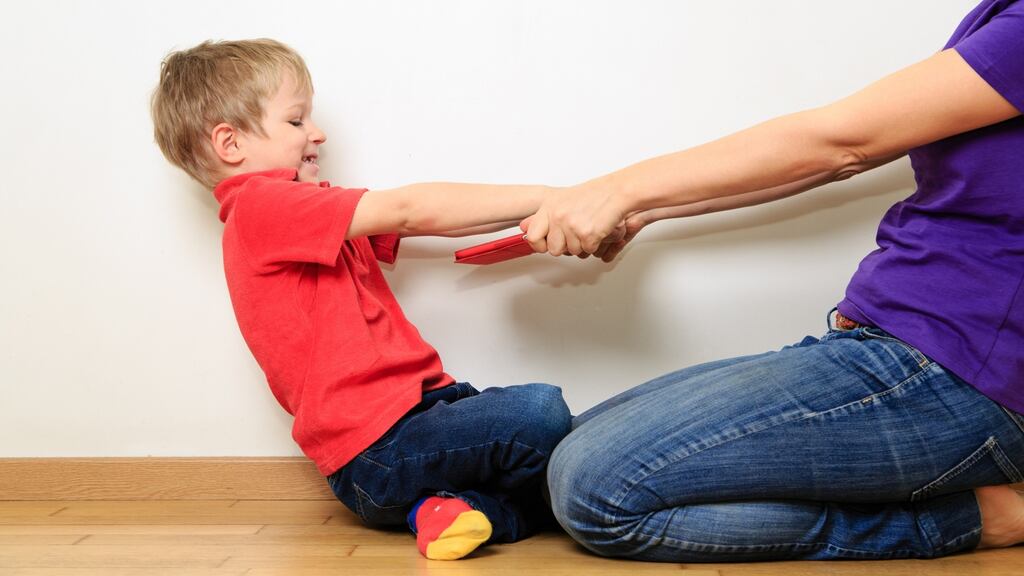 Children under two years who spend a lot of time in front of electronic screens have a ‘significantly higher chance’ of suffering from language delays and poor sleeping habits. Photograph: iStockphoto/Getty Images