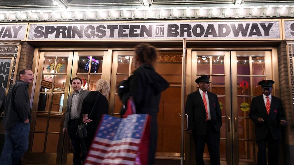 Attendees wait in front of the Walter Kerr Theater to see ‘Springsteen on Broadway’ in New York City. Photograph: Angela Weiss/AFP/Getty Images