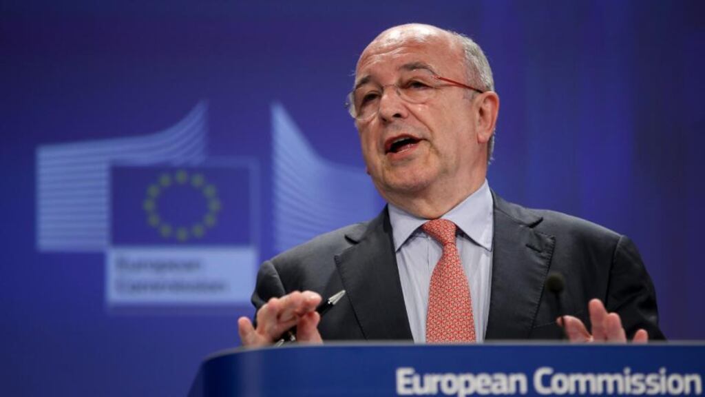 European Commissioner for Competition Joaquin Almunia announcing a tax probe on Apple, Starbucks and Fiat, at the EU headquarters in Brussels. Photograph: EPA/OLIVIER HOSLET