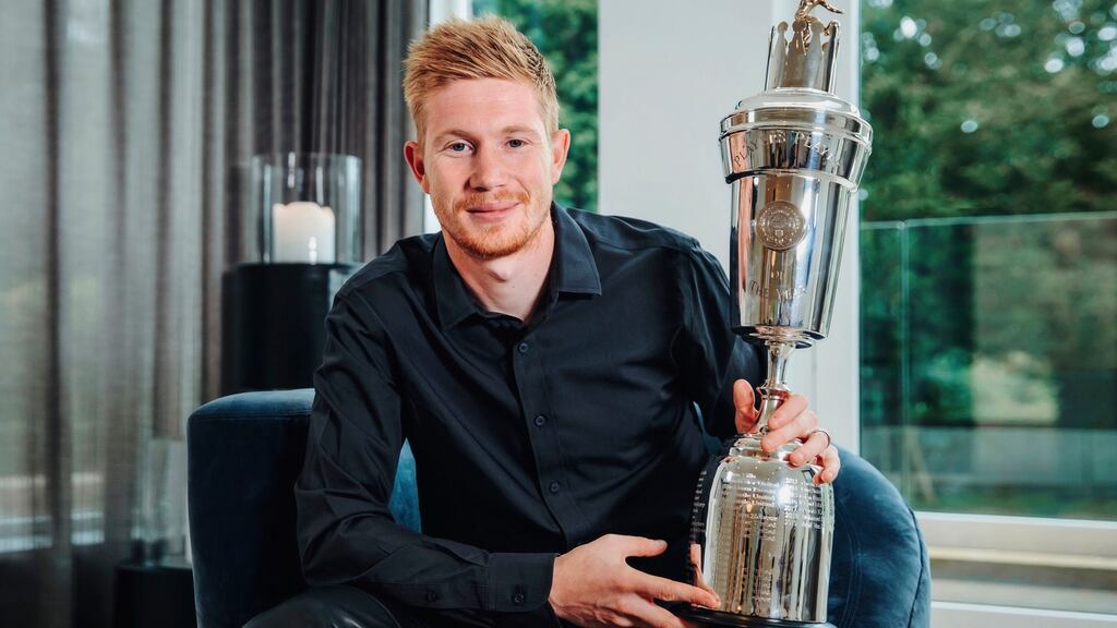 Manchester City’s Kevin De Bruyne shows off his PFA men’s player of the year award. Photograph: Manchester City Football Club/PA Wire
