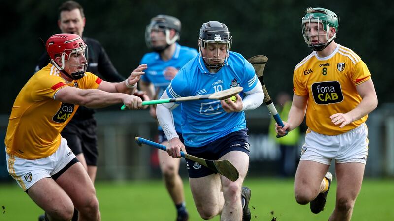 Dublin’s Cian O’Sullivan is tackled by Michael Bradley and Shea Shannon of Antrim at Parnell Park. Photograph: Evan Treacy/Inpho